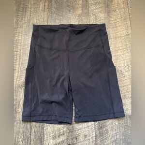 Athleta Interval Stash high rise black biker shorts
